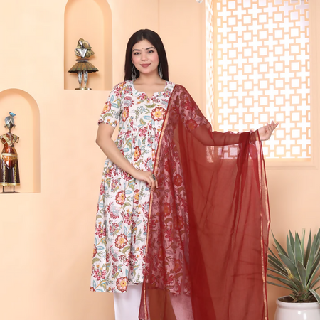 White floral alia cut kurti pant set with maroon kota doria dupatta