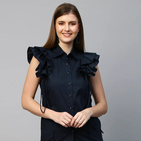 Sleeveless shirt with frills and tie-ups