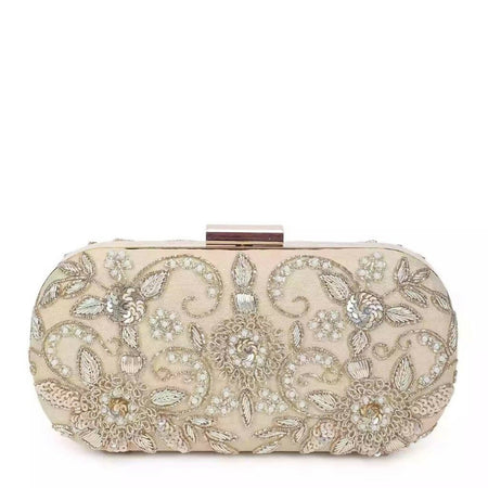 Thandai gold clutch