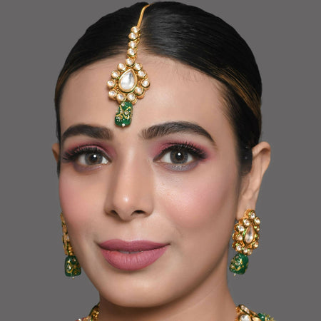 Gold toned multicolored kundan necklace with earrings & maang tikka