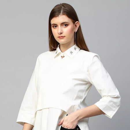 Top with embroidered collar and deconstructed front and back